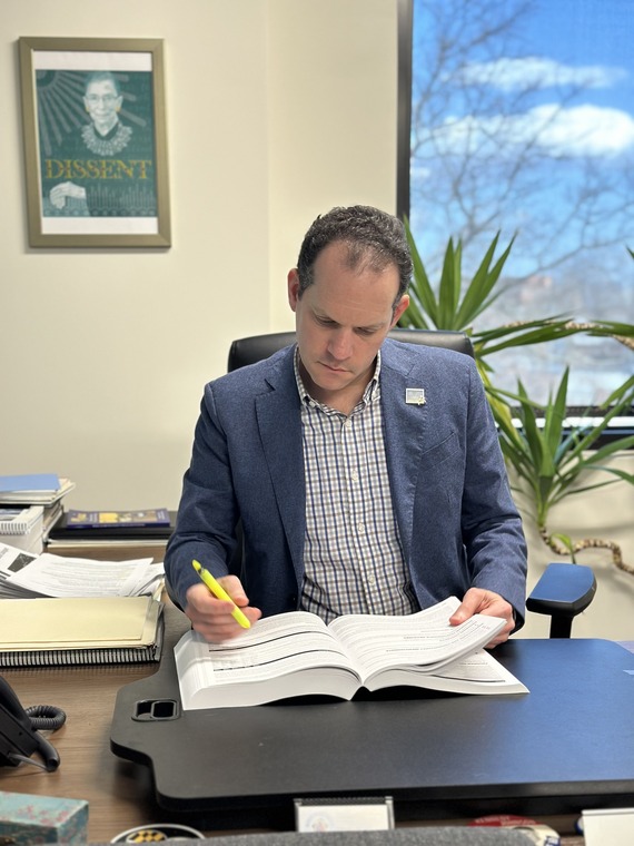 Councilmember Glass reading the proposed Operating Budget