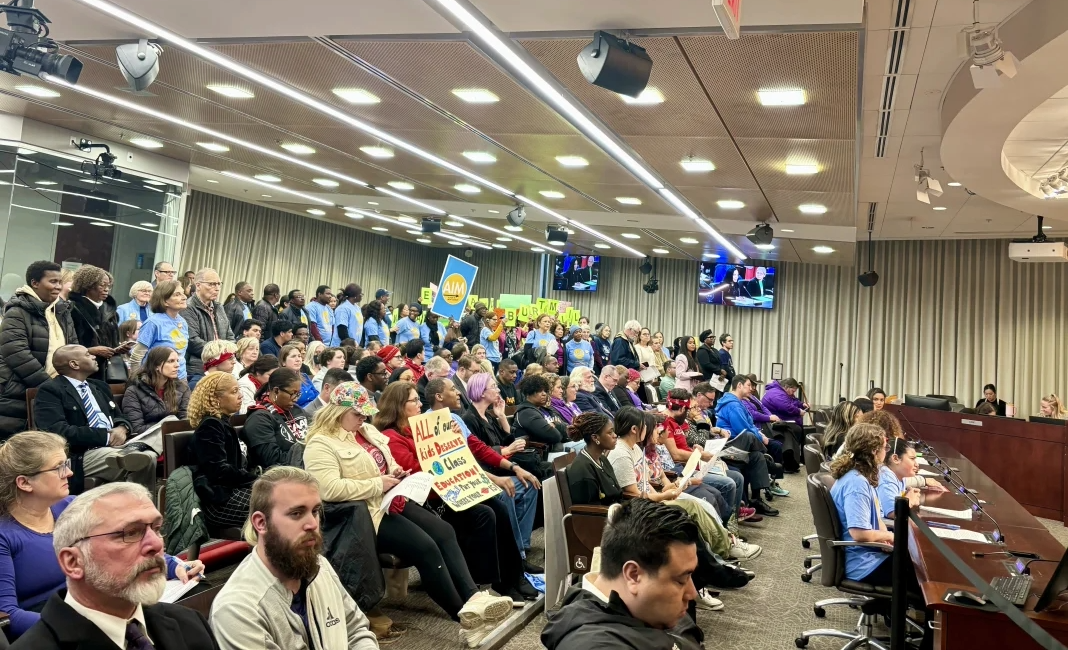 Crowded Council chamber room for budget public hearings.