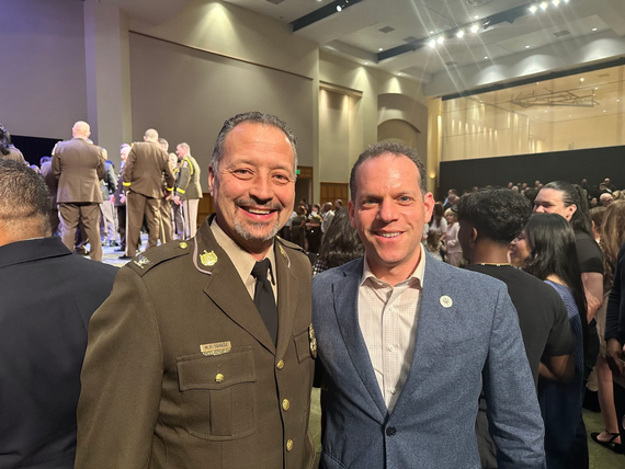 Councilmember Glass stands next to Montgomery County Police Chief Marc Yamada