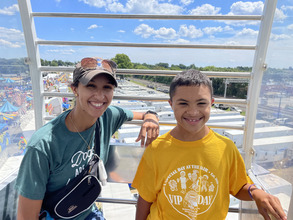 VIP participant and sister riding on ferris wheel