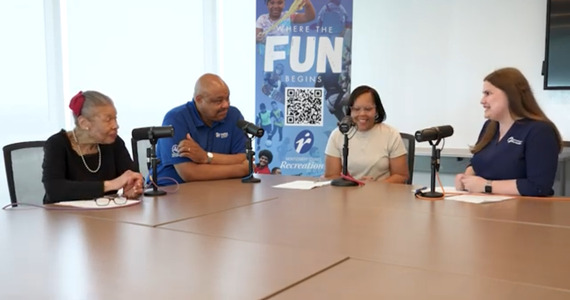 Podcast recording with host and three guests