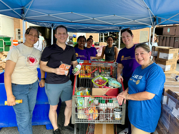 Councilmember Glass with Rainbow Place staff and volunteers.