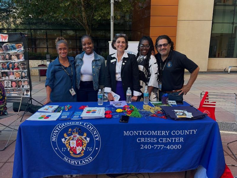 Council President Stewart and Crisis Center staff at an informational booth during International Overdose Awareness Day.