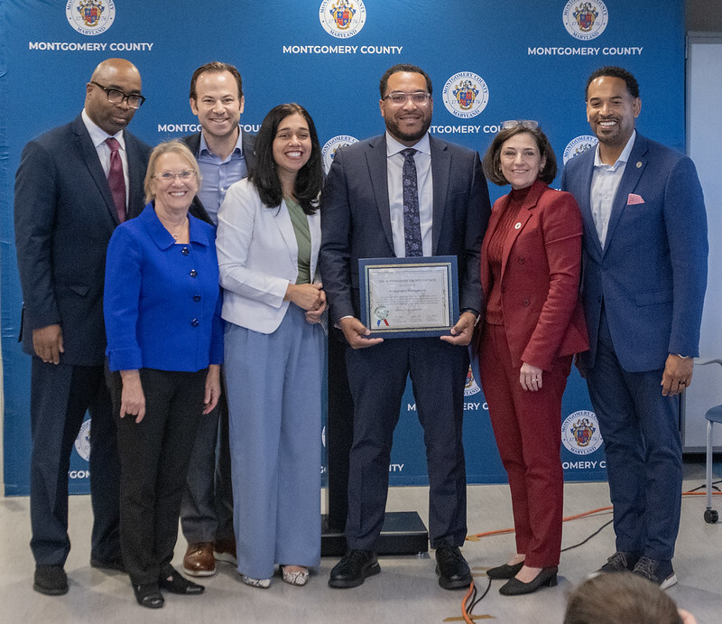 Councilmembers and state officials presenting a proclamation at the opening of the Mobilize Montgomery Federal Workforce Career Center.