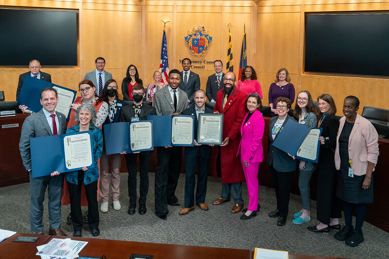 Montgomery County Council presenting a proclamation recognizing International Pronouns Day with local leaders.