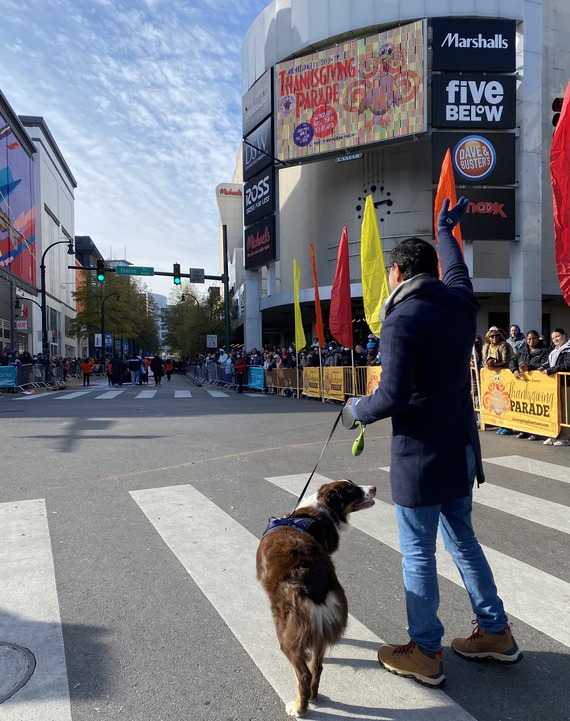Councilmember Gabe Albornoz with his dog at a past Thanksgiving parade