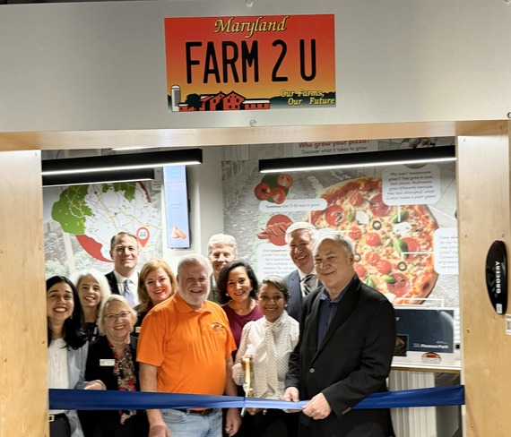 Ribbon cutting with local leaders at the Agricultural Storefront
