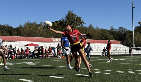 Youth Flag Football player making a catch