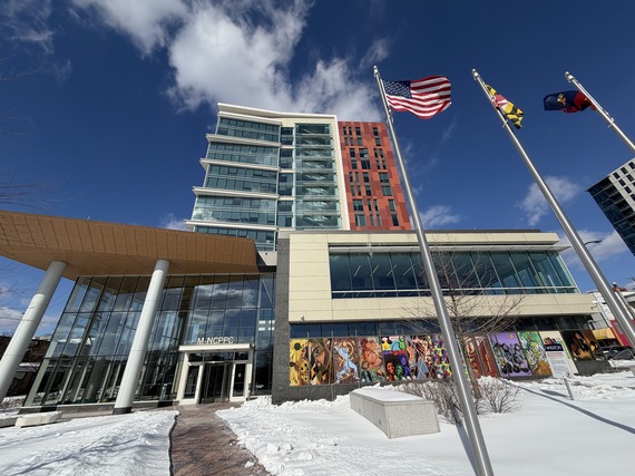 photo of m-ncppc building at 2425 reedie drive with a cleared walkway and snow on the landscape 