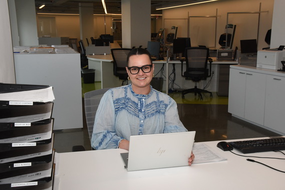 permit tech at work in the dps customer service lobby