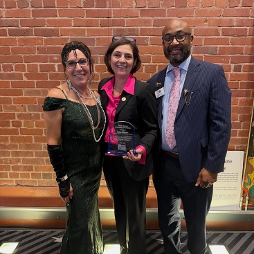CM Stewart with reps from the GSSCC and her award
