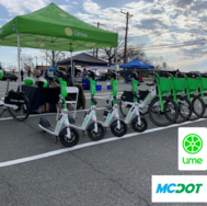 Escooter Lime Class with Lime tent and scooters parked in front
