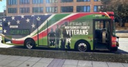 Ride On bus with Veteran Day wrap
