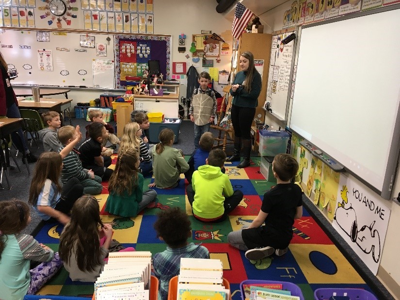 Green Leader and MES Senior Outreach Environmental Specialist Caitlin Eversmier at a school