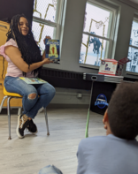 Author Aja Dorsey Jackson reading to kids 