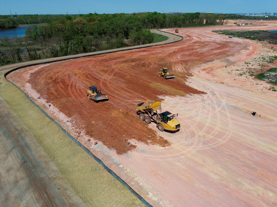 Dike raising at Cox Creek Dredged Material Containment Facility