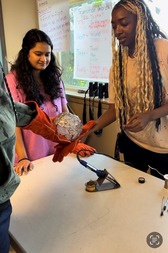 Attendees creating broken glass art