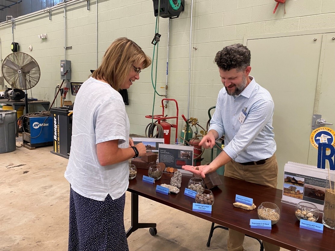 Cox Creek Open House attendee learns about the Innovative Reuse program