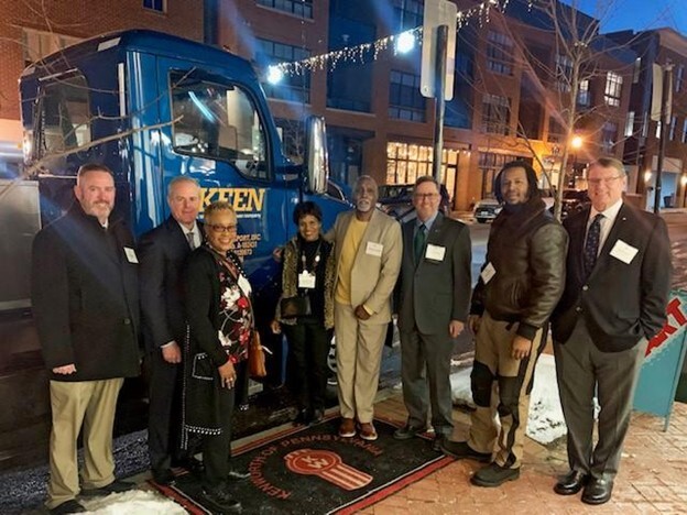 Members pose for a picture wit a Keen Truck