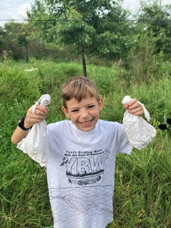 Theo Holding Bird Bags