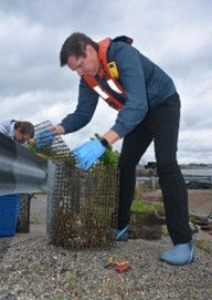 Vane Brothers unload oyster cages