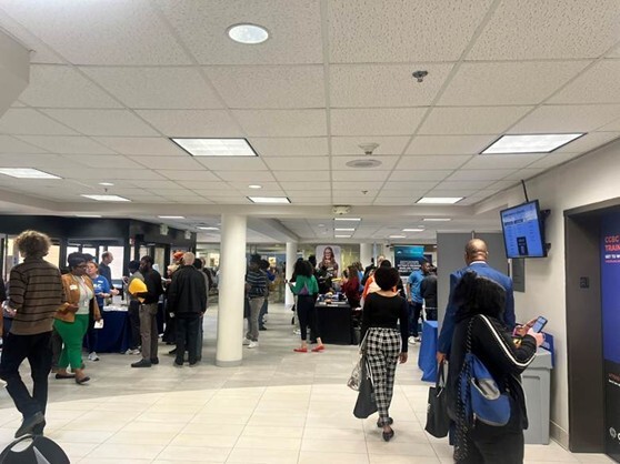 Image of people walking around the BPA hiring and career expo.