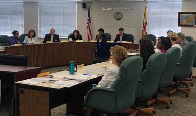 The Maryland State Board of Education meeting in the State Board Room around a "U" Shaped Table.