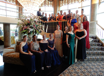 Group photo of all 24 Maryland Teachers of the Year standing on stair case at Gala venue 