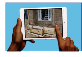 Virtual inspection via tablet, held in hands