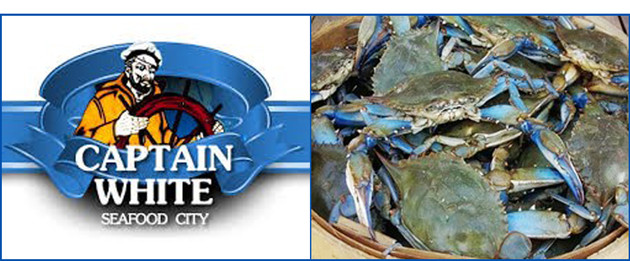 Captain White Seafood City logo and bushel of blue crabs for sale.
