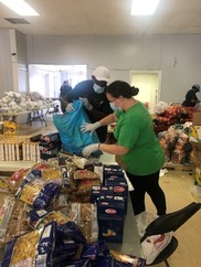 SEED Volunteers Working in Food Pantry