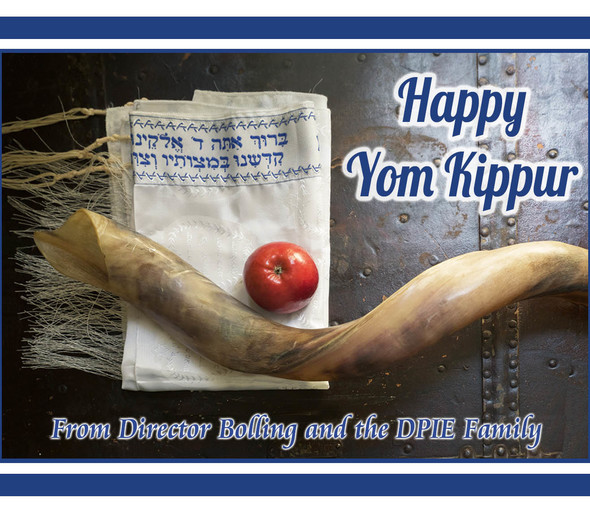 Yom Kippur flyer with cloth, apple, and horn