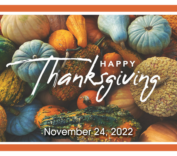 Happy Thanksgiving words superimposed over an array of gourds and pumpkins in orange and blue