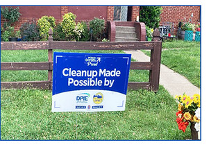 Clean It Lien It sign in yard after cleanup is completed