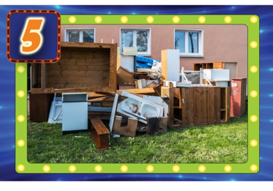 Name that Violation game last month's for Quiz Question number 5 - photo with debris and large trash items stored in the yard
