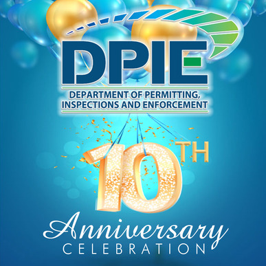 DPIE's 10th anniversary image, graphic of blue and gold balloons, number 10 and confetti