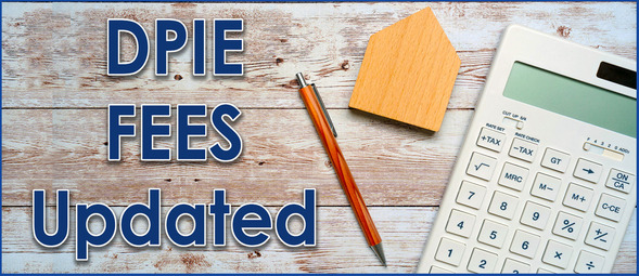 DPIE Fees Updated, photo of calculator and pencil on desk top