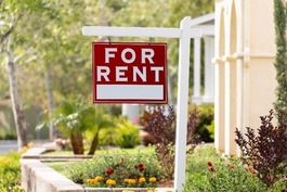For Rent Sign in Yard