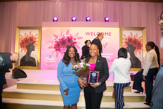 County Executive Braveboy with 2026 Women of Elevate Award Recipient Associate DCAO of Health, Human Services and Education Erica Turner