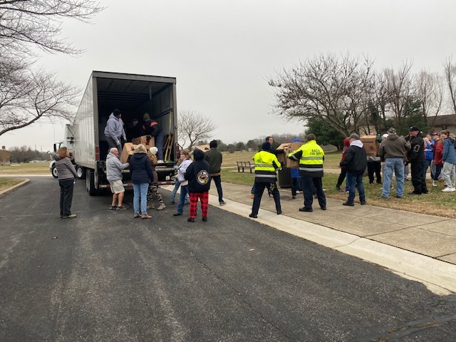 Crownsville Veterans Cemetery Volunteers unload trucks