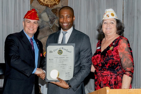 Secretary Tony Woods presents a Governor's citation to American Legion National Commander Daniel Seehafer