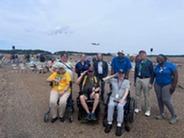 people at a air show outside
