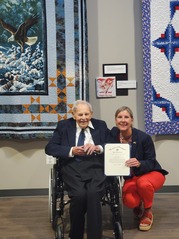 Deputy Secretary Dana Burl and War II Navy Veteran Patrick L. Carpentier 