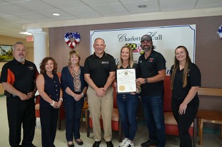 staff from Charlotte Hall Veterans Hoem get a donation from ACE Hardware