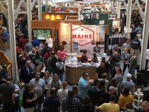 Visitors shop, dine and explore the State of Maine Building