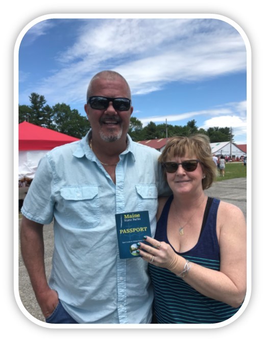 Bruce and Eileen with a Passport Booklet