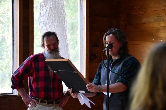 Morten receiving the KLT Harry Dwyer Forest Stewardship Award from Kirsten Brewer, KLT Director of Membership and Programming