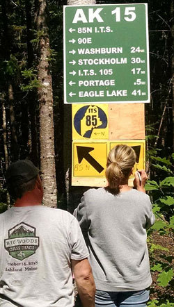 Directional signage improvements by RTP program on Maine ITS trails.