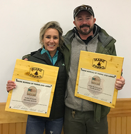 Brooke and Adam McKay of Range Pond State Park with farewell service recognition plaques.