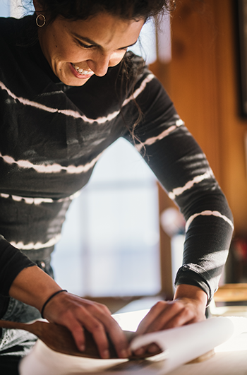 Photo of Jordan Parks working in her studio. Photo by Lauren Sophia courtesy of Jordan Parks.